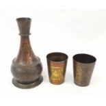 A Copper Antique Islamic Water Vessel with Two Drinking Cups. Inlaid decoration throughout. Vessel -