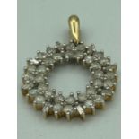 10 carat GOLD and WHITE DIAMOND PENDANT having 40 clear white stones. 2.5cm drop.2.0 cm width. 2.2