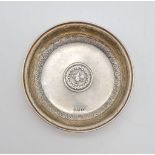 An Early Ottoman Solid Silver Mini Tray - With decorative coin at centre. 7cm diameter. 13.44g