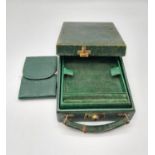A Victorian Sewing and Jewellery Box. Green Leather with Velvet interior. 14 x 17cm. A/F
