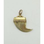 A 14k Yellow Gold Claw set Pendant/Charm - 5.4g.