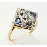 A Sophisticated Art Deco 18K Yellow Gold Sapphire and Diamond Ring. Stones set on a platinum