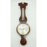 A Vintage Mahogany Comitti of London Wall Barometer and Thermometer. 54cm. Good condition but A/F.