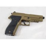 A VERY REALISTIC "SIG SAUER" CO2 PISTOL MODEL P226 WITH DROP OUT MAGAZINE, 1.77 CAL