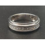 18CT WHITE GOLD DIAMOND SET 1/2 ETERNITY RING WEIGHS 5.5G . HAS 1.10CT AND IS A SIZE P