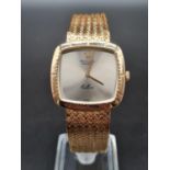 A gents ROLEX CELLINI, solid 18 K yellow gold watch and strap, 30 mm bezel with smoked grey dial and