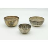 Three Antique Indian Style Solid Silver Bowls. 7.5, 10.5 and 11cm diameter. 240g total weight.