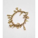 A 9K Yellow gold Belcher Charm Bracelet with 18 charms - 15.8g