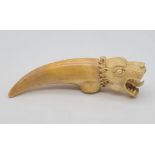 An Antique Chinese Hand-Carved Ivory Walking Stick Handle. Incorporating the design of a dagger