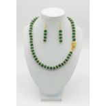 A statement emerald and cubic zirconia necklace with a clasp in the style of Cartier panther. With