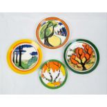 A collection of 4 plates by Wedgewood featuring limited design prints by Claris Cliff in original