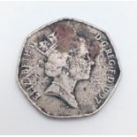 A circulated 1997 UK 50 pence, this is the first of the smaller coins and also the last coin with