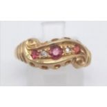 An 18 K yellow gold ring with diamonds and rubies. Ring size: P, weight: 2.9 g.