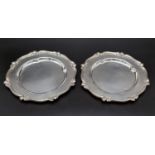 A pair of antique silver white metal plat dishes, diameter 17.5cm, combined weight of 492.3 grams