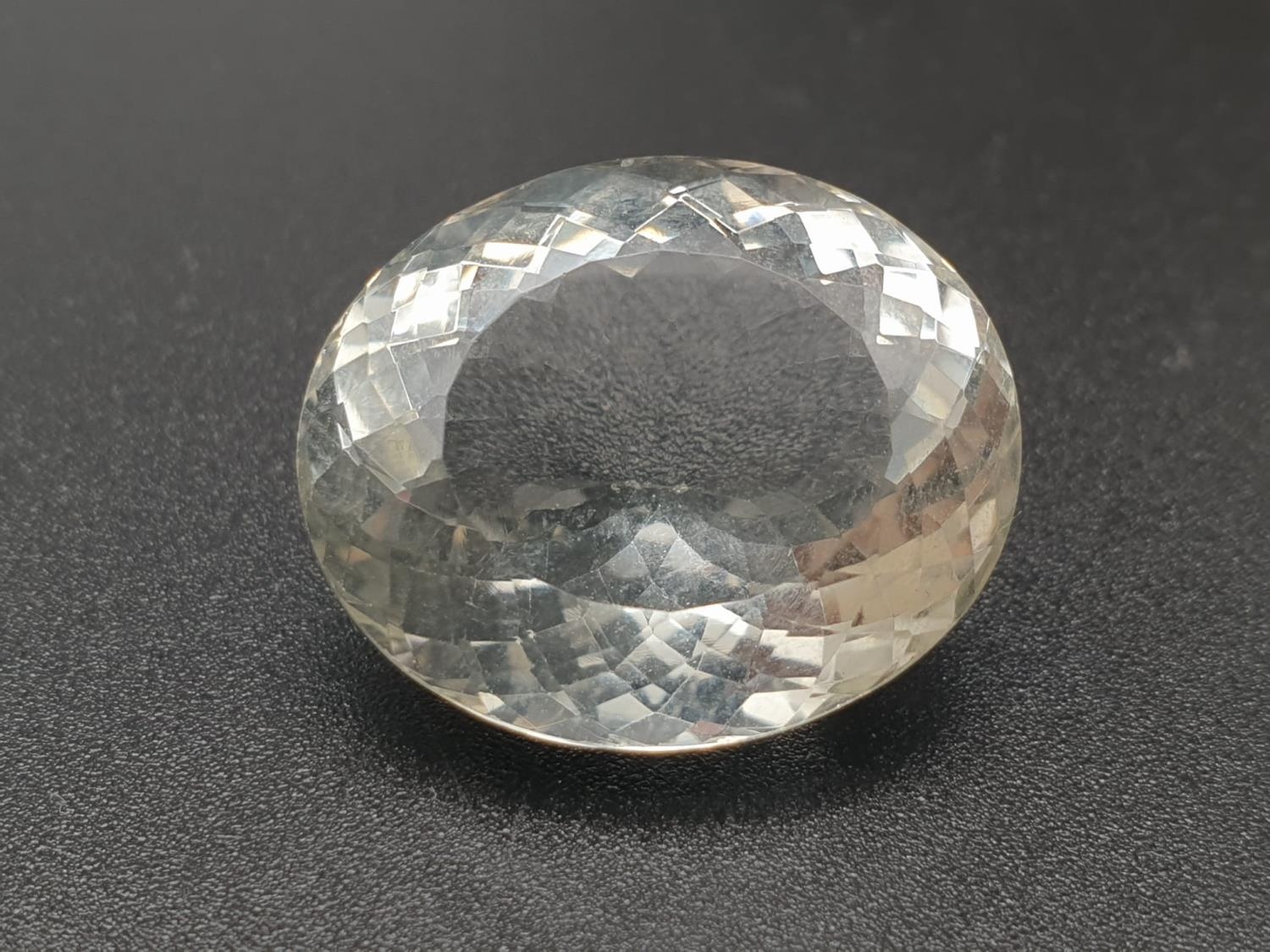 A 27.62ct Natural Green Praseolite in an Oval Shape. Come with ITLGR Certificate