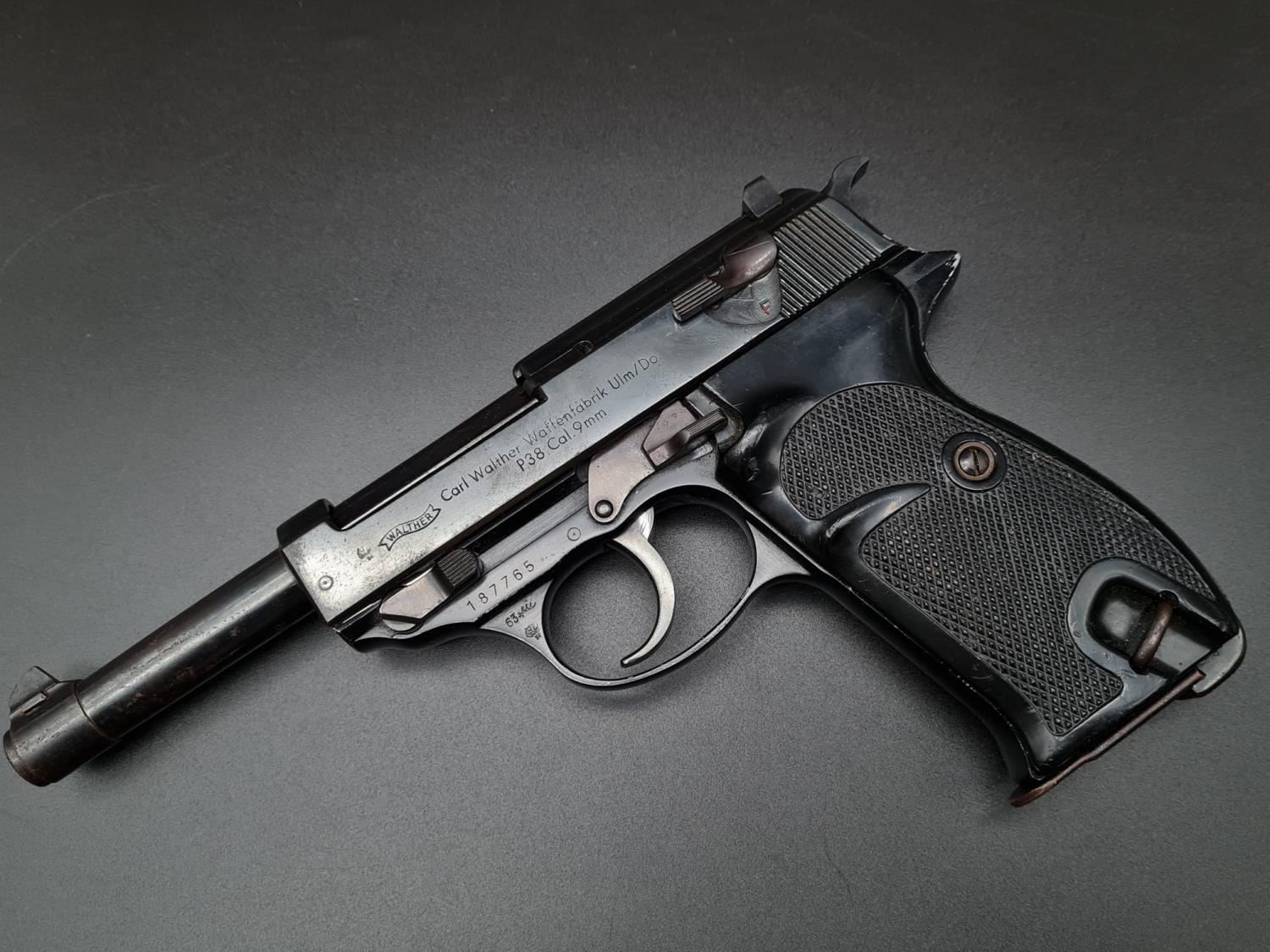 A WW2 Era Original Carl Walther P38 9mm Deactivated Pistol. 21.5cm length. Good condition.