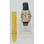 A FRANCK MULLER VINTAGE LOOK LADIES FASHION WATCH WITH SPARE FRANCK MULLER LEATHER STRAP. 28 X 25mm