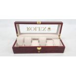 A Rolex six watch display box with shutter-proof glass and highly polished veneer. Ideal for