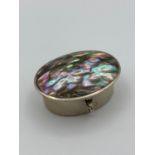 Abalone topped ?Alpaca Silver? pill box. Hinge and clasp in perfect condition. 4 x 3 cm.