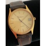 Genuine vintage Gentlemans FILLANS QUARTZ WRISTWATCH in gold tone with date window and sweeping
