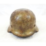 WW2 Africa Corps M40 Helmet. Rim stamped with the letter ?Q? for the maker F.W. Quist, G.m.b.H.