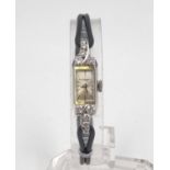 A Vintage Jules Jurgenson 14K Gold and Diamond Ladies Watch. Black leather strap. 14K white gold