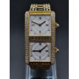 AN ABSOLUTELY STUNNING DIAMOND ENCRUSTED DRESS WATCH BY ROBERGE IN SOLID 18K GOLD AND WITH DUAL TIME