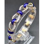 A STUNNING BLUE ENAMEL AND DIAMOND BRACELET WITH APPRX 8CT OF FINE WHITE DIAMONDS. 47.4gms 19cms