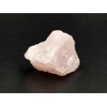 A 187ct Natural Rose Quartz Gemstone in an irregular shape. Come with GLI Certificate