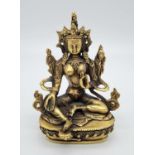 AN ANTIQUE BRASS BUDDHIST GODDESS. 358gms 14cms