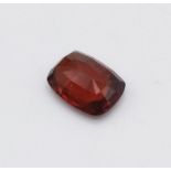 A 5.04ct Natural Hessonite Garnet in the Cushion shape. Come with ITLGR Certificate