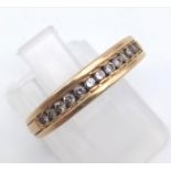 An 18 K yellow gold half eternity ring with diamonds (0.3 carats). Ring size: L, weight: 2.6 g.