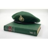 A mint condition Royal Marine Commando green beret with Officer?s badge. 100% wool with real leather