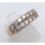 A 14 K yellow gold ring with two rows of diamonds (0.6 carats). Ring size: N, weight: 5.2 g.