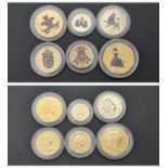 Six Gold Plated and Colourful Commemorative UK Coins. As new in mint condition.