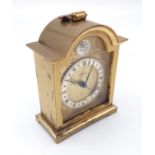 A Beautiful Brass Eight-Day Boudoir Swiza Alarm Clock. Swiss made. Gilded Dial decoration.