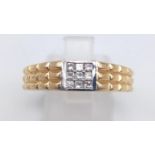 An 18 K yellow gold ring with a nine diamond cluster (0.36 carats). Ring size: S, weight: 4.5 g.