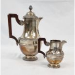 An Antique French Solid Silver Two-Piece Coffee Set. Coffee Pot-25cm. Jug-12cm. 603g total weight.