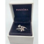 Genuine SILVER PANDORA RING having stone set DAISY design. Inside band showing 925 silver and