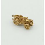 9k yellow gold vintage car charm, weighs 4 grams