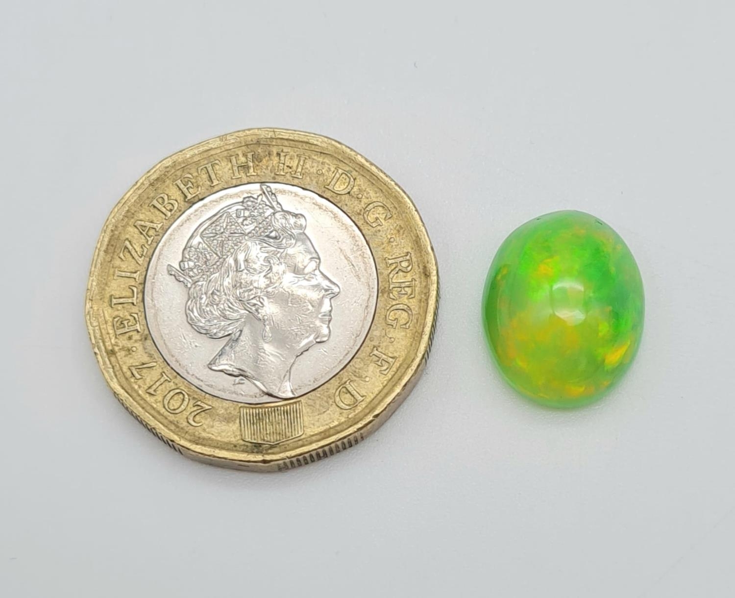 A 4.18ct Natural Green Fire Opal Gemstone in Oval Cabochon. Come with IGL&I Certificate - Image 3 of 4