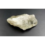 A 751ct Green Amethyst Rough Uncut in an irregular shape. Come with GLI certificated