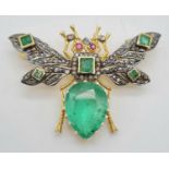 Butterfly Brooch with a Green Onyx Pear shape and 0.70ct diamonds , ruby eyes, emerald squares