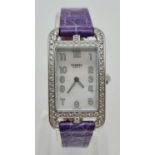 A HERMES LADIES RECTANGUAR DIAMOND ENCRUSTED DRESS WATCH IN STAINLESS STEEL AND QUARTZ MOVEMENT.