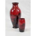 An Early Pair of Flambe by Royal Doulton Vases. Both in very good condition. Small vase - 13cm tall.