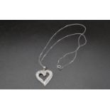 A 9 K white gold, heart shaped pendant with diamonds and chain. Total weight: 5.3 g.