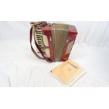 A Vintage Italian Alvari Red and White Accordion. In very good condition and working order. 43 x