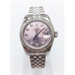 A LADIES ROLEX OYSTER PERPETUAL DATEJUST WHITE GOLD AND STEEL, WITH PINK FACE AND DIAMOND NUMERALS.