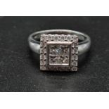 An 18K White Gold Diamond Cluster Ring. 5.6g. Size O. 1ct.