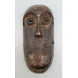 Antique 19th century African ivory carved passport mask, in early days this kind of mask use to be